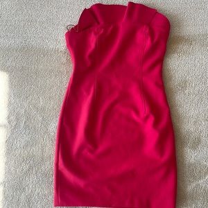 Bright pink/red “Marcy Dress” from cinq a sept, ruffle top, silicon band support